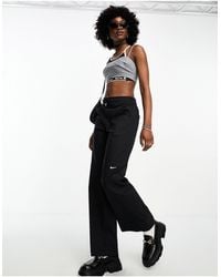 Nike - Mini Swoosh High Rise Woven Trousers - Lyst