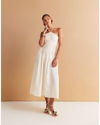 Mango - Robe à encolure américaine avec jupe évasée volumineuse - écru - Lyst