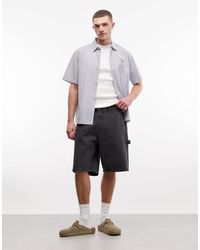 Obey - Pantalones Cortos Vaqueros Negros Holgados De Estilo Carpintero Bigwig De - Lyst