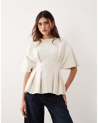 ARRANGE - Knit Short Sleeve Cinched Pleated Top - Lyst