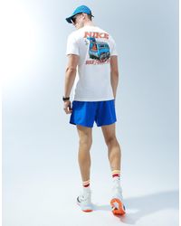 Nike - Camiseta blanca con estampado trasero sole rally - Lyst