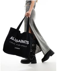 AllSaints - Bolso tote negro con lavado ácido underground - Lyst