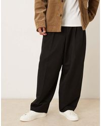 ASOS - Pantalones De Vestir Negros De Corte Tapered Ancho Con Pinzas De - Lyst