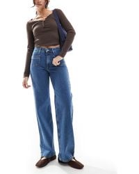 ONLY - Juicy - jean ample à taille haute et poches - moyen délavé - Lyst