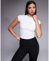 4505 - Cap Sleeve Performance Baby T-Shirt - Lyst