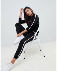 ASOS Joli survêtement avec sweat-shirt et pantalon de jogging basique avec lien et attaches contrastantes - Noir