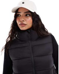 Stradivarius - Gewatteerd Jack Met Gebreide Mouwen - Lyst