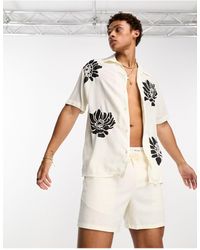 SELECTED - Camicia oversize bianca con colletto a rever e stampa floreale - Lyst