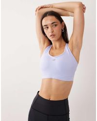 New Balance - Essential Run Sports Bra - Lyst