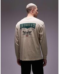 Levi's - Camiseta De Manga Larga Con Estampado En La Espalda De Logo Clásico De 2 Caballos De -Neutro - Lyst