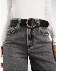 ASOS - Cintura da jeans per vita e fianchi nera con fibbia oro intrecciata - Lyst