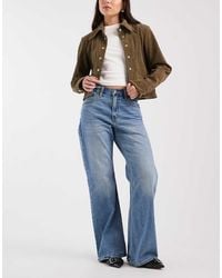 Levi's - Loose Bootcut Denim Jeans - Lyst