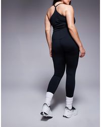 4505 - Curve Icon Active Bum Sculpt High Waist Gym legging With Inner Pocket - Lyst