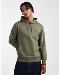 Fred Perry - Sweat à capuche avec logo et liseré - kaki - Lyst