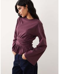 ASOS - Getailleerde Top Met Peplum Zoom En Lange Mouwen - Lyst