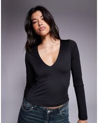 ASOS - Top à manches longues en tissu double épaisseur avec décolleté plongant en v - Lyst