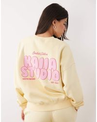Kaiia - Cotton Rich Printed Logo Back Graphic Oversized Sweatshirt - Lyst