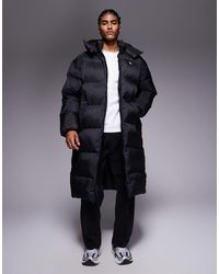 Calvin Klein - Longline Quilted Puffer Jacket - Lyst
