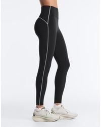 Oysho - Reflective High-rise Compressive Core Control Ankle-length leggings - Lyst