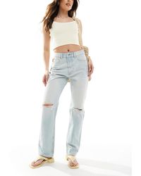 ASOS - Jean droit à taille mi-haute et déchirures - pâle délavé - Lyst