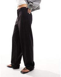 Pimkie - Pantaloni ampi sartoriali neri regolabili sul lato - Lyst