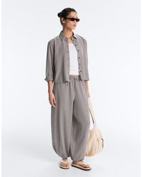 Oysho - Lyocell Blend Gingham Maxi Bloomer Trousers - Lyst