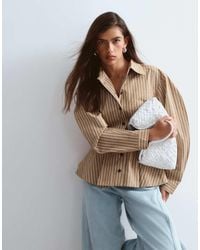 ARRANGE - Structured Collared Peplum Shirt With Contrast Buttons - Lyst