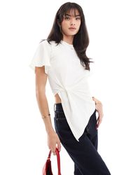 ONLY - T-shirt bianca con allacciatura laterale - Lyst