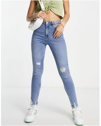 Miss Selfridge - Lizzie - jeans skinny a vita alta lavaggio medio con strappi sul fondo - Lyst