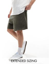 ASOS - Pantalones cortos verde oscuro extragrandes - Lyst