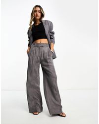 AllSaints - Elle Tapered Flare Trousers - Lyst