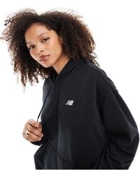 New Balance - Sport essentials - sweat à capuche en tissu éponge - Lyst