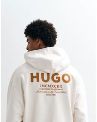 HUGO - Nazardo - sweat à capuche ample d'ensemble avec imprimé au dos - écru - Lyst