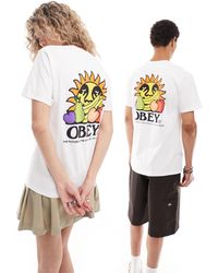 Obey - T-shirt unisex bianca con grafica con sole e frutta sul retro - Lyst