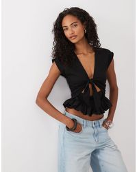 ASOS - Tie Front Cutout Top With Peplum Hem - Lyst