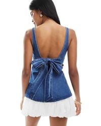 ASOS - Denim Peplum Top With Bow Back Detail - Lyst
