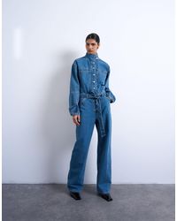 TOPSHOP - Denim Funnel Neck Belted Jumpsuit - Lyst