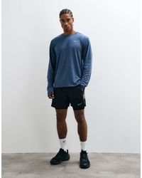 Nike - Miler Dri-Fit Winterised Long Sleeve Top - Lyst