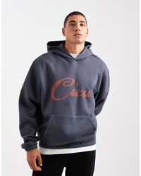 ASOS - Sweat à capuche décontracté avec imprimé craquelé - bleu - Lyst