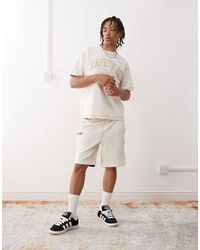 Aape By A Bathing Ape - Aape by a bathing ape - short molletonné réversible avec logo - cassé - Lyst