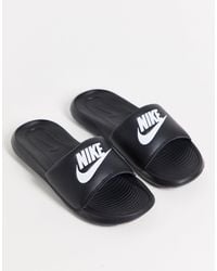 Nike - Sandalias negras victori - Lyst