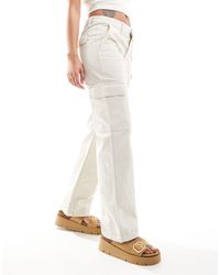 Mango - Jeans dritti bianchi con tasche - Lyst