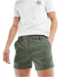 ASOS - Pantalones cortos chinos ajustados en - Lyst