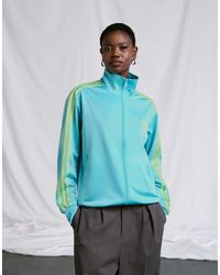 adidas Originals - X asos - firebird - haut - Lyst