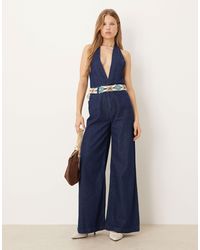 ASOS - – neckholder-jumpsuit aus denim mit weitem bein und rinse-waschung - Lyst