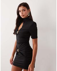 Ruched & Ready - Sculpted High Neck Sculpted Cut Out Hardware Detail Mini Dress - Lyst