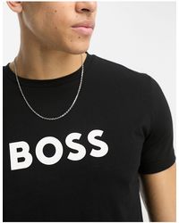BOSS - T-shirt da mare nera con logo - Lyst