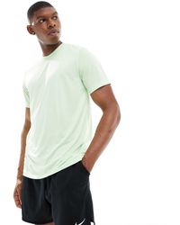 Nike - Camiseta verde dri-fit legend - Lyst