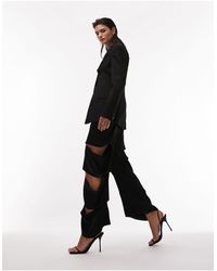 TOPSHOP - Premium - pantaloni a fondo ampio con intagli nero - edizione limitata - Lyst