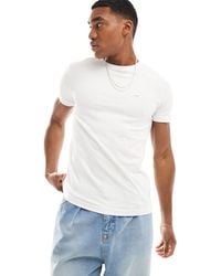 Calvin Klein - T-shirt slim fit elasticizzata bianca - Lyst